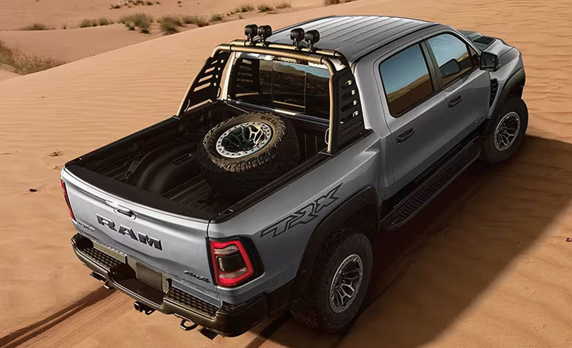2023 Ram 1500 Being Driven Off-Road on Sand
