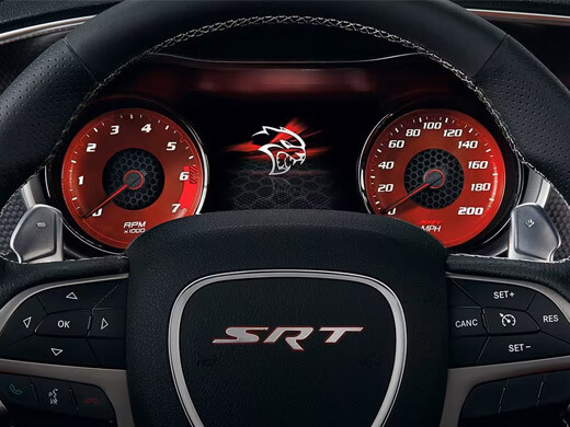 The steering wheel and Digital Cluster Display in a 2023 Dodge Charger SRT Hellcat.