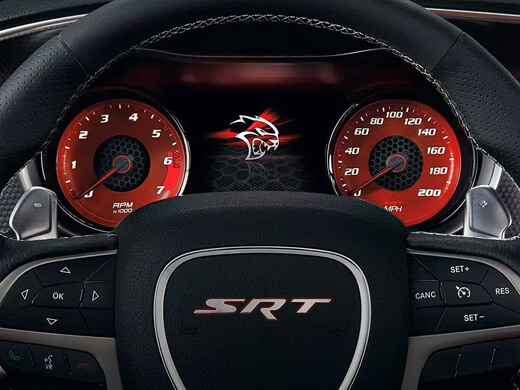 The steering wheel and Digital Cluster Display in a 2023 Dodge Charger SRT Hellcat.